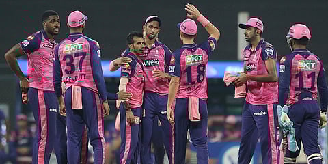 Rajasthan Royals team celebrates after the wicket of Delhi Capitals' Axar Patel during an IPL 2022 at Wankhede Stadium in Mumbai. (Photo| PTI)