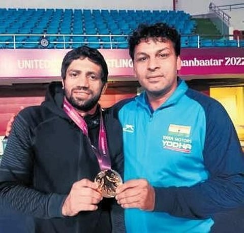 Ravi Dahiya with coach Sujeet Maan. ( File Photo)