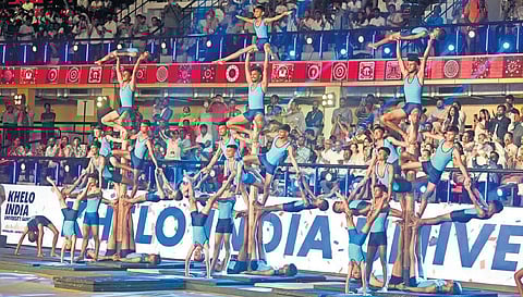 Athletes perform Mallakhamb during the opening ceremony of Khelo India University Games on Sunday | Express