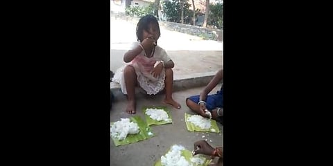 The video also shows Narikuravar children having merely cooked white rice. (Videograb)