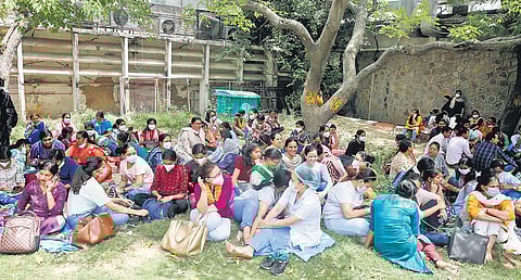 Nurses sitting on strike at the AIIMS campus on Tuesday, The strike was called off in the evening | Express