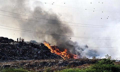 Perungudi landfill in Chennai is on fire for the second consecutive day even as efforts to douse it continue. (Photo | Martin Louis, EPS)