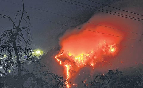 Smoke billows from a forest fire in Shimla on April 23 | PTI