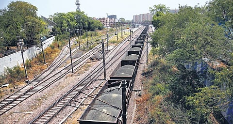 A train transporting coal from Chhattisgarh passes through Safdarjung Railway Station in New Delhi on Saturday | SHEKHAR YADAV