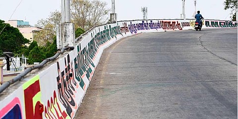 The Palakarai railway bridge at Tiruchy city covered in graffiti on Sunday | MK Ashok Kumar