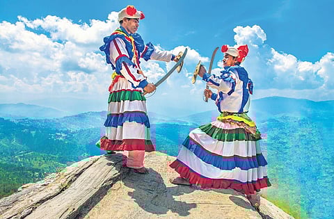 Girls from the Ahir tribe, Gujarat; (middle) A Konyak tribesman from Nagaland.
