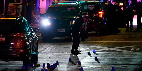 Investigators search for evidence in the area of a mass shooting In Sacramento. (Photo | AP)