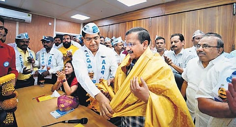 B Bhaskar Rao with AAP chief Arvind Kejriwal at the party office on Monday | pTI