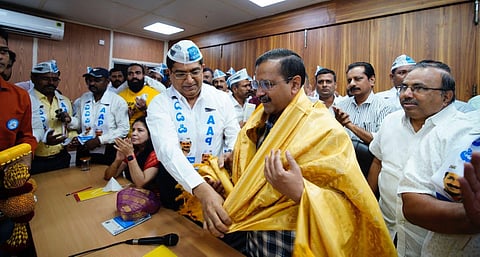 Bhaskar Rao with Aam Aadmi Party chief Arvind Kejriwal in New Delhi. (Photo | Twitter)