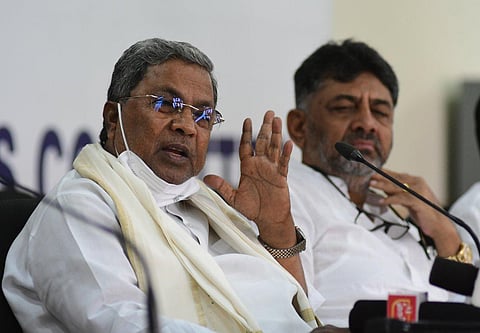 CLP leader Siddaramaiah and KPCC chief DK Shivakumar address the media in Bengaluru. (Photo | Shriram BN, EPS)