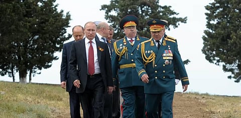 Ruling clique: Putin with some of his top military and intelligence officers in Crimea in 2014. (EPA/Alexey Druginyn/Ria Novosti/Kremlin pool)