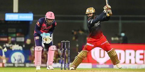 Dinesh Karthik of RCB plays a shot during the IPL match between the Rajasthan Royals and the Royal Challengers Bangalore, at the Wankhede Stadium in Mumbai. (Photo | PTI)