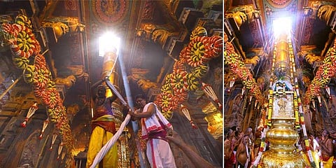 Priests hoisting Kodimaram (flag) at the temple to mark beginning of festival