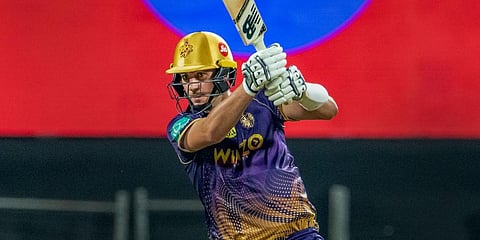 Pat Cummins of KKR plays a shot during the IPL match between the Kolkata Knight Riders and the Mumbai Indians, at the MCA International Stadium in Pune. (Photo | PTI)