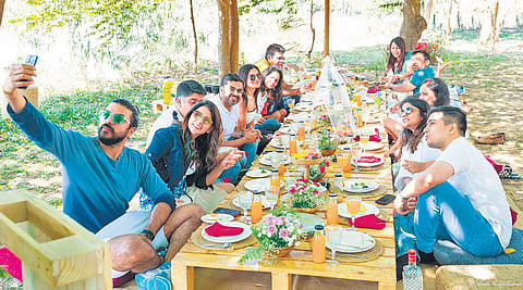 Customers enjoying a picnic organised by The Picnic Company