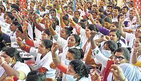 Corona warriors protest demanding regularisation of their services | Vinod Kumar T