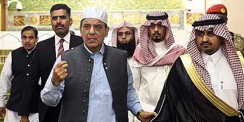 Pak PM Shahbaz Sharif, third left, visits Prophet Muhammad’s mosque in Medina, Saudi Arabia and performs prayers with his delegation late Thursday, April 28, 2022. (Photo | AP)