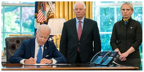 President Joe Biden signs the Ukraine Democracy Defense Lend-Lease Act of 2022 in the Oval Office of the White House, Monday, May 9, 2022, in Washington. (Photo | AP)