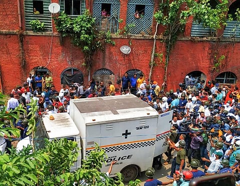 Police take away the body of a BJP leader who was found hanging at an abandoned railway quarter at Kashipur, near Kolkata, Friday, May 6, 2022. (Photo | PTI)