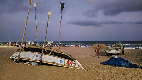 Anchored boats on the shore after India Meteorological Department issued an alert for coastal states regarding Cyclone Asani, in Puri district. (File Photo | PTI)