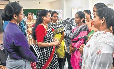 AP Women’s Commission Chairperson Vasireddy Padma interacts with members of women’s protection organisations at Kanuru on Tuesday I Prasant Madugula