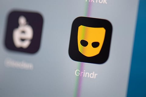 Logo of the US social networking application Grindr on the screen of a tablet. (Photo| AFP)