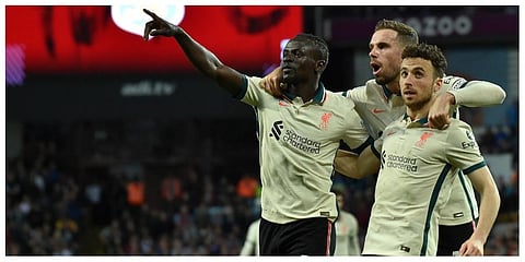 Liverpool's Sadio Mane, left, celebrates with his teammates after scoring against Aston Villa during the English Premier League soccer match between Aston Villa and Liverpool. (Photo |AP)
