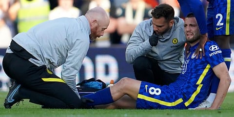 Chelsea's Mateo Kovacic is treated for an injury during the English Premier League soccer match between Leeds United and Chelsea at Elland Road in Leeds, England. (Photo | AP)