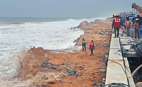 The boulders deposited for protecting the diaphragm wall has been washed away by rough sea waves near the Shankumugham -Airport road | B P Deepu