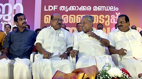 K V Thomas along with CPI(M) leader and Kerala Chief Minister Pinarayi Vijayan in a bypoll meeting of the Left party-led front in Kochi. (Photo | A Sanesh, EPS)