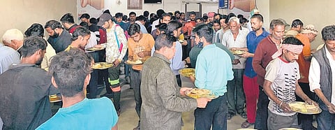 Patrons waiting to be served by servers