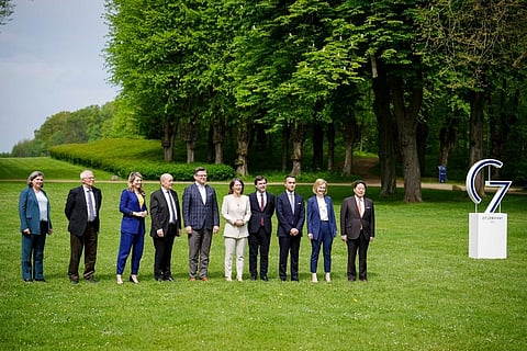 Ministers stand together for the family photo during the G7 Group of leading democratic economic powers at the Weissenhaus, Germany. (Photo | AP)