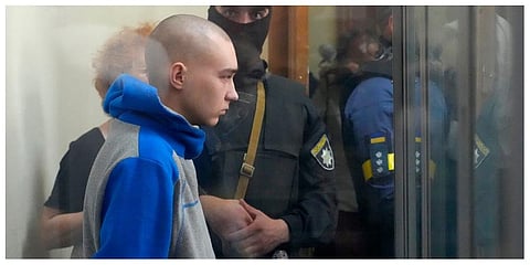 Russian army Sergeant Vadim Shishimarin, 21, is seen behind a glass during a court hearing in Kyiv, Ukraine, Friday, May 13, 2022. (Photo | AP)
