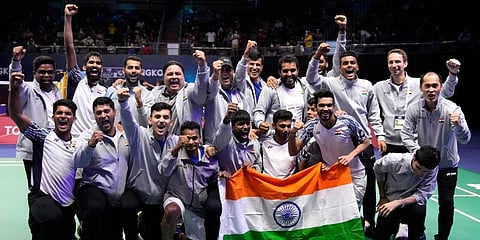 India's team members pose with their nation flag after winning Thomas Cup title in Bangkok, Thailand. (Photo | AP)