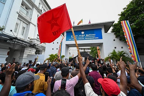 Protestors take part in an anti-government demonstration outside the Sri Lanka police headquarters in Colombo on May 16, 2022, demanding the arrest of government supporters.(AFP)