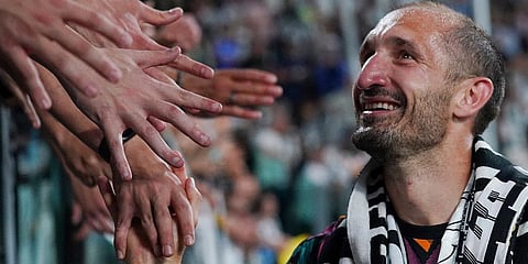 Juventus's Giorgio Chiellini greeted by fans during the Serie A soccer match between Juventus and Lazio at Allianz Stadium, Turin, Italy. (Photo | AP)