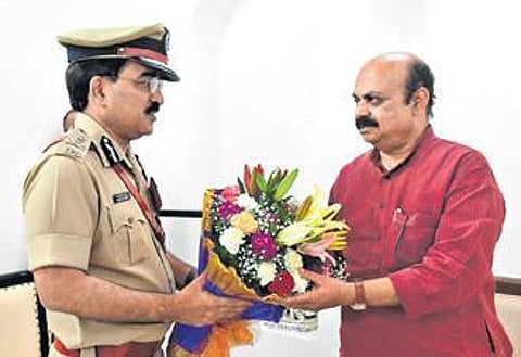 CM Basavaraj Bommai greets the new city police commissioner Pratap Reddy