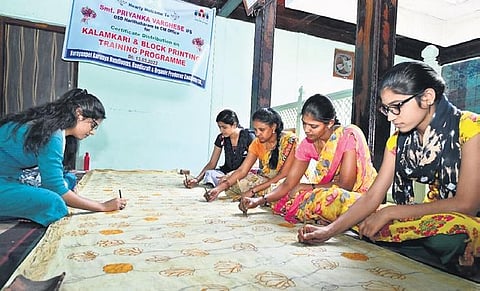 A group of girls hone their Kalamkari skills at the training session on Tuesday