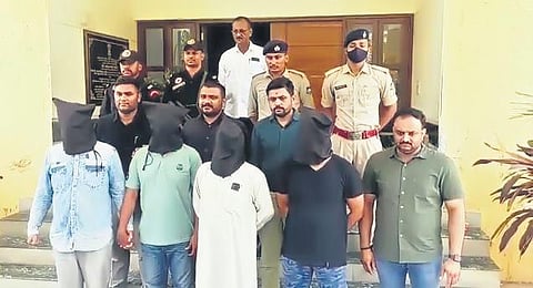 ATS officers present the four arrested men before the media | Express