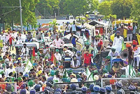 Farmers of the Sanyukt Kisan Morcha protest near Chandigarh-Mohali border after being stopped from heading towards the UT, in Mohali on Tuesday | pti