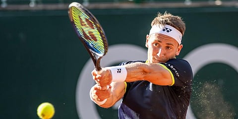 Casper Ruud returns a ball to Benoit Paire during their second round match, at the ATP 250 Geneva Open tournament in Geneva, Switzerland. (Photo | AP)