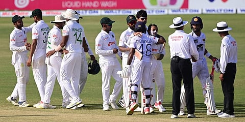 Sri Lankan and Bangladesh players greet each other at the end of the first Test match at the Zahur Ahmed Chowdhury Stadium in Chittagong. (Photo| AFP)
