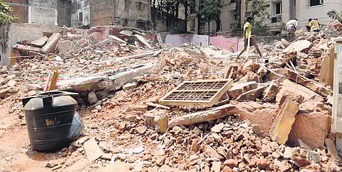 A house demolished during the eviction drive at Govindasamy Nagar on Greenways Road in Chennai, on Sunday. (Photo | EPS, R Satish Babu)