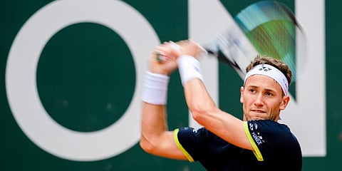 Casper Ruud returns a ball to Thanasi Kokkinakis during their quarter-final match, at the ATP 250 Geneva Open Tennis tournament in Geneva, Switzerland. (Photo | AP)