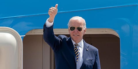 US President Joe Biden gestures as he boards Air Force One for a trip to South Korea and Japan. (Photo | AP)