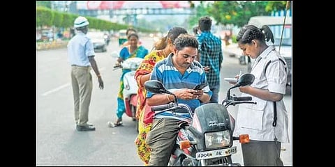 Police urge commuters to install Disha app in Vijayawada | Prasant Madugula