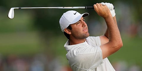 Scottie Scheffler watches his tee shot on the 11th hole during the second round of the PGA Championship golf tournament at Southern Hills Country Club in Tulsa, Okla. (Photo | AP)