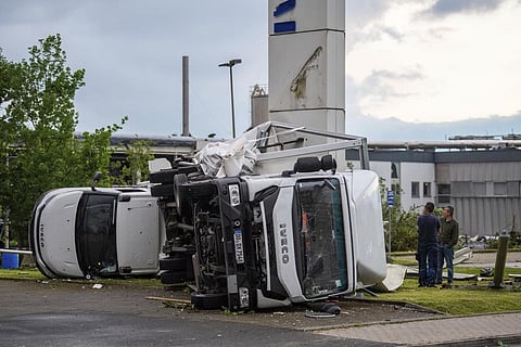 Two trucks overturned after a storm in Paderborn, Germany. (Photo | AP)