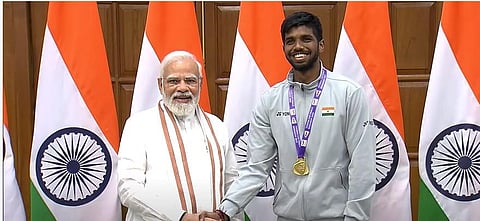 PM Narendra Modi with a winner of Thomas Cup. (Photo| Special Arrangement)