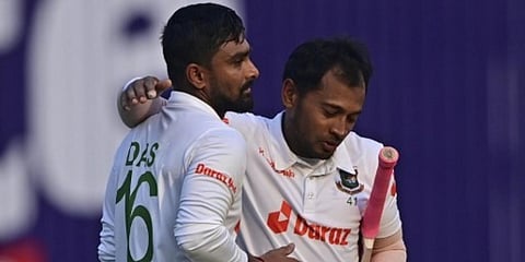 Bangladesh's Mushfiqur Rahim (R) embraces his teammate Liton Das at the end of Day 1 of the 2nd Test match against Sri Lanka at the Sher-e-Bangla National Cricket Stadium in Dhaka. (Photo| AFP)
